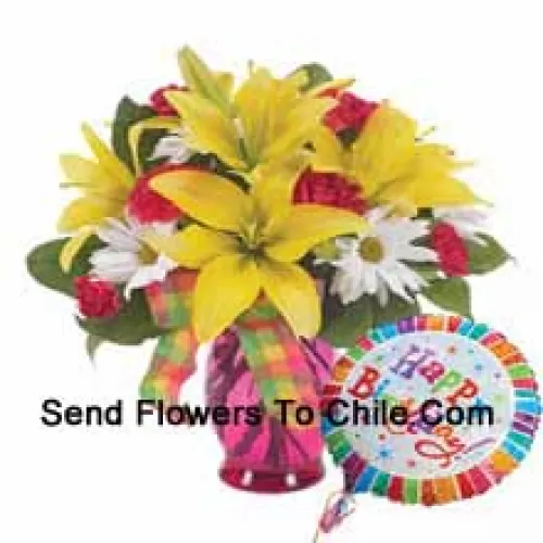 Red Carnations, Yellow Lilies And White Gerberas In A Glass Vase Accompanied With A "Birthday" Helium Balloon