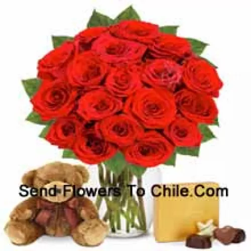 11 rosas rojas con algunos helechos en un jarrón de cristal acompañadas de una caja de chocolates importados y un lindo oso de peluche marrón de 12 pulgadas de altura