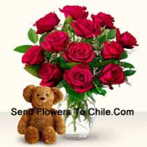 11 Red Roses With Some Ferns In A Glass Vase Along With A Cute 12 Inches Tall Brown Teddy Bear