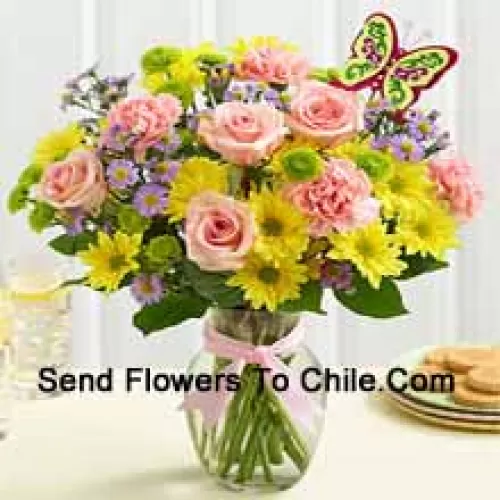 Pink Roses, Pink Carnations And Yellow Gerberas With Seasonal Fillers In A Glass Vase -- 25 Stems And Fillers