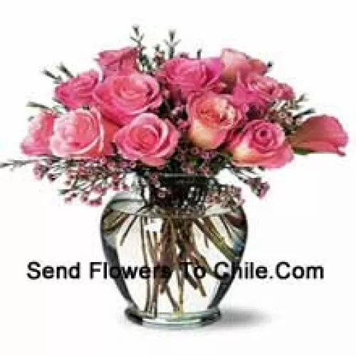 11 Pink Roses With Some Ferns In A Vase