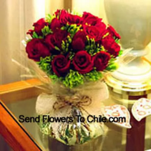 11 Red Roses With Some Ferns In A Vase