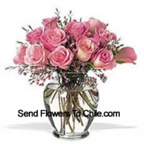 Bunch Of 11 Pink Roses With Some Ferns In A Vase