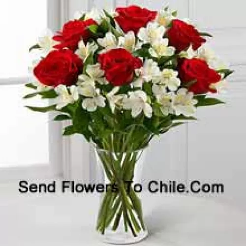 7 Red Roses With Assorted White Flowers And Fillers In A Glass Vase