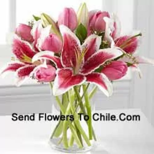 Pink Lilies And Pink Tulips In A Glass Vase